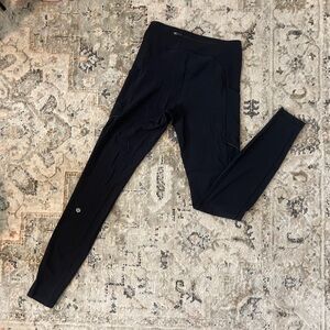 Authentic black Lululemon leggings. Size 2. Side and back pockets. Like new.